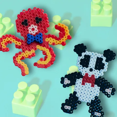 Photo of iron beaded octopus on top of Lego bricks