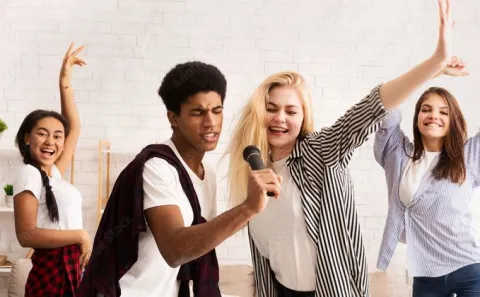 Teens singing karaoke