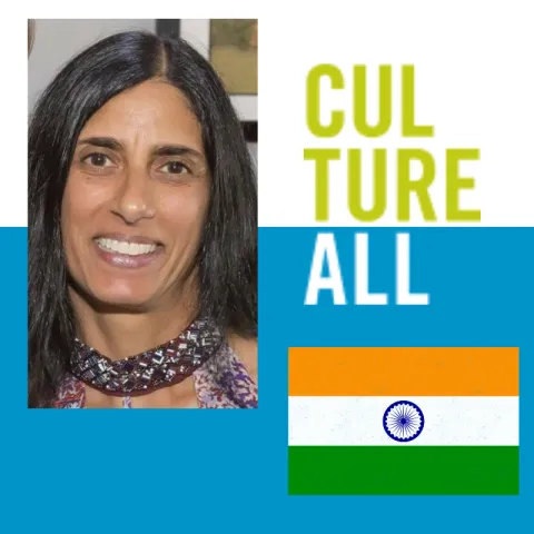 Image of woman presenter and the Indian flag.